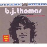 THOMAS B.J.